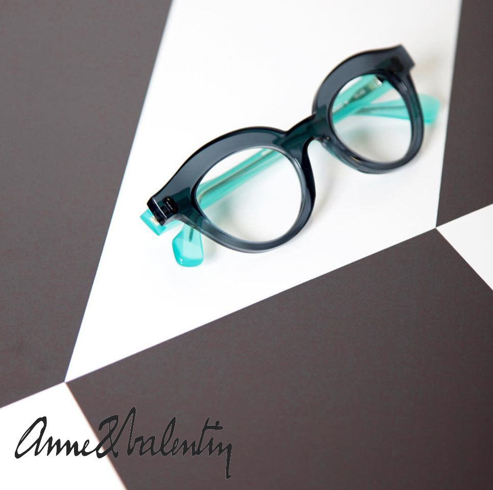 Anne et Valentin eyewear cover shot in beautiful crystal grey and teal acetate, clicking this image links to Anne et Valentin products. 