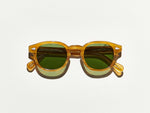 Polished blonde acetate MOSCOT Lemtosh Sunglasses with green glass lenses front view