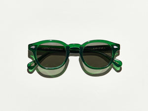 Polished semi-transparent emerald green acetate MOSCOT Lemtosh Sunglasses with grey lenses front view